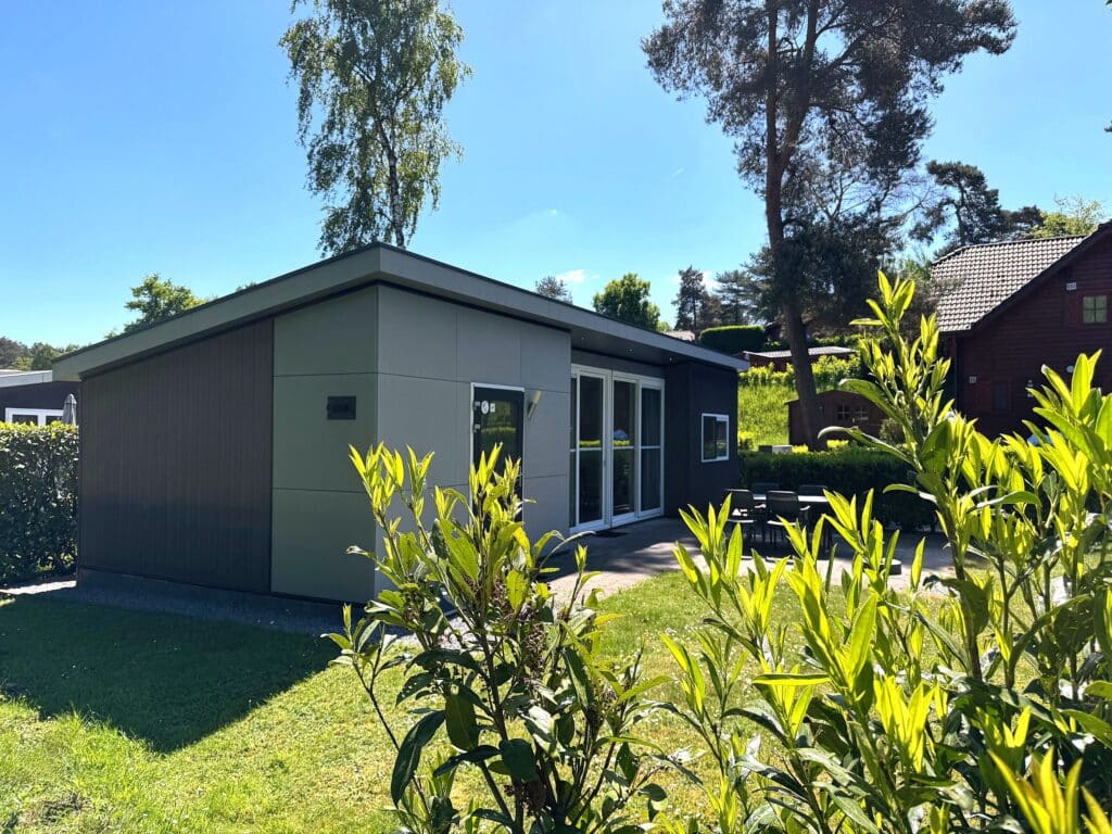 vakantiehuis chalet te koop EuroParcs Brunssummerheide Brunssum Limburg Pavilion Mistique Type Pavilion Mistique kavel 120 vakantiehuis Limburg chalet Limburg vakantiehuis EuroParcs moderne vakantiewoning luxe vakantiehuis vakantiehuis in natuur vakantiehuis aan bosrand natuurhuisje recreatiewoning recreatiewoning te koop tweede woning investeren in recreatiewoning vakantiepark Brunssummerheide vakantiehuis EuroParcs Brunssummerheide rustige ligging vakantiehuis met tuin vakantiehuis met terras modern chalet design vakantiehuis woonkamer vakantiehuis interieur vakantiehuis keuken vakantiehuis slaapkamer vakantiehuis badkamer vakantiehuis uitzicht heide natuurgebied Limburg vakantiehuis met uitzicht familievakantie Limburg vakantie in Zuid-Limburg EuroParcs woning EuroParcs chalet woning te koop Brunssum vakantiehuis kopen Limburg duurzaam vakantiehuis recreatief wonen modern vakantiehuis ontwerp vakantiehuis met comfort vrijstaand vakantiehuis chalet te koop Limburg recreatiepark Limburg vakantiewoning Brunssum heidegebied vakantiehuis wandelen Brunssummerheide fietsen Limburg vakantie in Nederland natuur en rust chalet met tuin vakantiehuis voor gezin vakantiehuis voor verhuur investering vakantiehuis vakantiepark in natuur