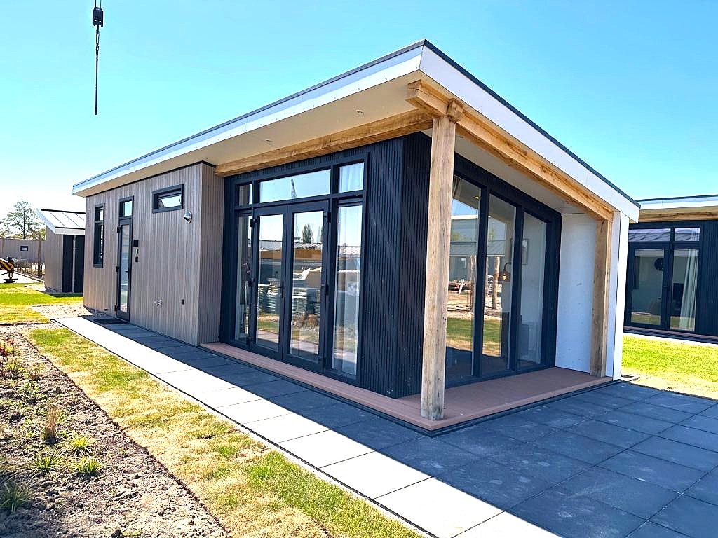 Type Zeebries 4p Kavel 69 Oysterduinen Resort Yerseke vakantiehuis Zeeland vakantiehuis 4 personen moderne vakantiewoning luxe vakantiehuis Zeeuwse kust Yerseke accommodatie dicht bij zee vissersdorp Yerseke natuur en rust strandje op loopafstand vissershaven nabij Oosterschelde omgeving tuin en terras comfortabel verblijf weekendje weg Zeeland familievakantie Nederland vakantie aan het water
